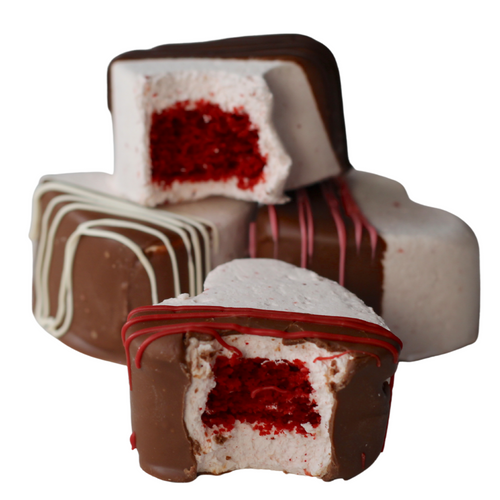valentine's hears with bites taken out, revealing red velvet cake