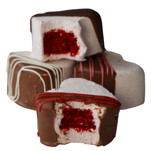 valentine's hears with bites taken out, revealing red velvet cake