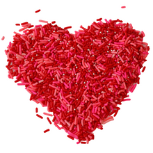 Load image into Gallery viewer, red, pink and white sprinkles, made into the shape of a heart