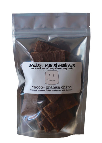 Packaged bag of homemade graham cracker chips with milk chocolate coating