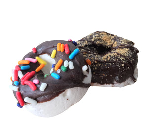 Marshmallows in the shape of mini donuts, with chocolate coating